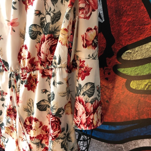 E&M Brand size Large new with tags white floral romper. Super cute! Ruffles - Picture 2 of 5